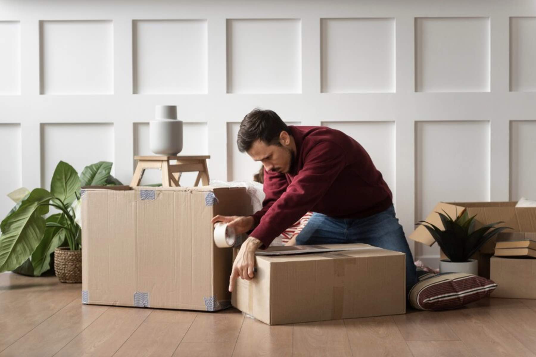 A man packing for self-move